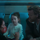 A behind the scenes shot of the Obi-Wan Kenobi series showing director Deborah Chow and actors Vivien Lyra Blair and Ewan McGregor.